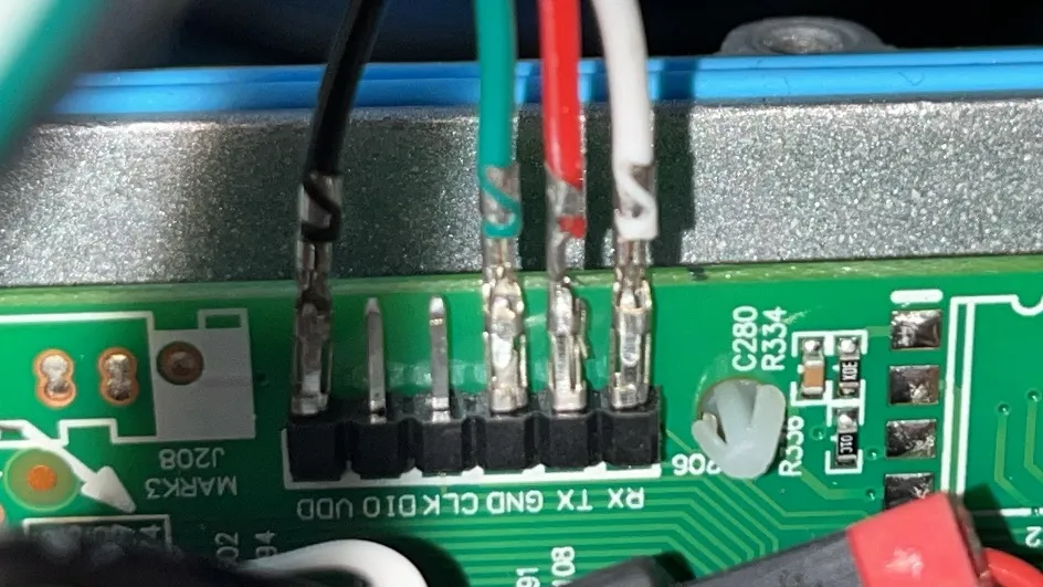 Solterra charger UART header close-up